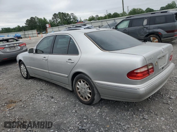 2000 Mercedes-Benz E 320 with VIN WDBJF65J1YB099417, listed as a Copart auction lot 54656915 with 130,387 mi miles and Salvage Title. Bid and sale history available at DreamBid. Image 2.