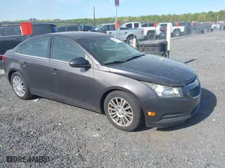 2014 Chevrolet Cruze ECO with VIN 1G1PH5SB5E7411551, listed as a IAAI auction lot 42093893 with 135,984 mi miles. Bid and sale history available at carsss.com. Image 1.