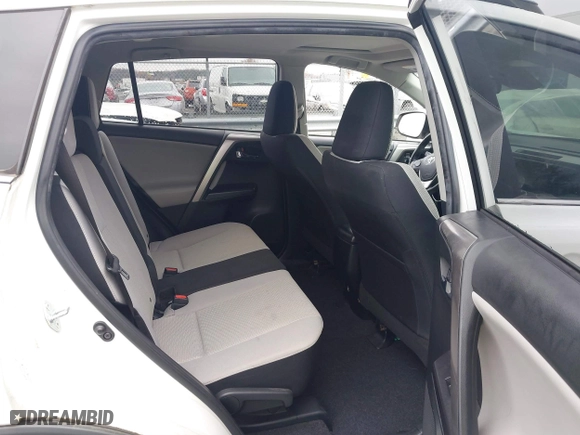2017 Toyota RAV4 XLE with VIN JTMRFREV6HJ716907, listed as a IAAI auction lot 41056444 with 118,335 mi miles. Bid and sale history available at carsss.com. Image 8.