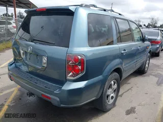 2007 Honda Pilot EX-L with VIN 5FNYF28597B006341, listed as a IAAI auction lot 41808955 with 225,819 mi miles. Bid and sale history available at carsss.com. Image 4.