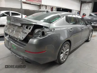 2015 Kia Optima SX Turbo with VIN 5XXGR4A6XFG469733, listed as a IAAI auction lot 42494569 with 145,397 mi miles and . Bid and sale history available at DreamBid. Image 4.