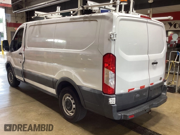 2015 Ford Transit Cargo with VIN 1FTNR1ZM1FKA44965, listed as a IAAI auction lot 42679340 with 151,641 mi miles and . Bid and sale history available at DreamBid. Image 16.