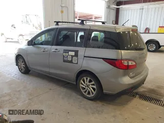2015 Mazda 5 Sport with VIN JM1CW2BL0F0185433, listed as a IAAI auction lot 42594468 with 189,696 mi miles and . Bid and sale history available at DreamBid. Image 3.