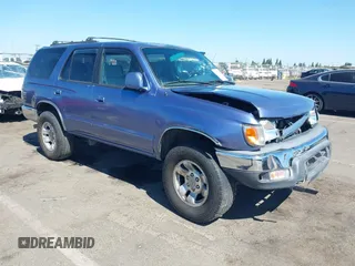 2000 Toyota 4Runner SR5 z VIN JT3HN86RXY0273875, wystawiony jako IAAI lot #42539268 z przebiegiem 226 828 mil mil oraz . Historia ofert i sprzedaży dostępna na DreamBid. Obrazek 1.