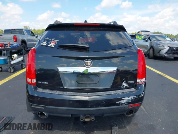 2013 Cadillac SRX Premium Collection with VIN 3GYFNEE34DS535613, listed as a IAAI auction lot 42336365 with 106,426 mi miles and . Bid and sale history available at DreamBid. Image 17.