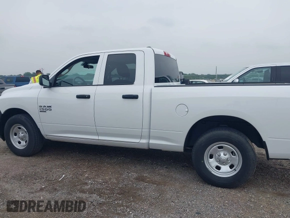 2023 Ram 1500 Tradesman z VIN 1C6RR6FG9PS527089, wystawiony jako IAAI lot #42261047 z przebiegiem 20 684 mil mil oraz . Historia ofert i sprzedaży dostępna na DreamBid. Obrazek 14.