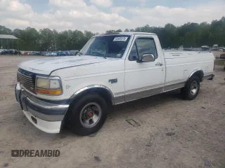 1992 Ford F-150 z VIN 1FTDF15N1NNA07365, wystawiony jako Copart lot #53405315 z przebiegiem 210 388 mil mil oraz Szkoda całkowita • Salvage title. Historia ofert i sprzedaży dostępna na DreamBid. Obrazek 1.