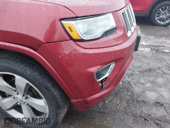 2014 Jeep Grand Cherokee Overland with VIN 1C4RJFCG9EC299235, listed as a IAAI auction lot 41670065 with 108,589 mi miles and . Bid and sale history available at DreamBid. Image 19.