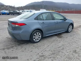 2020 Toyota Corolla LE with VIN JTDEPRAEXLJ001297, listed as a IAAI auction lot 41880882 with 76,407 mi miles. Bid and sale history available at carsss.com. Image 4.