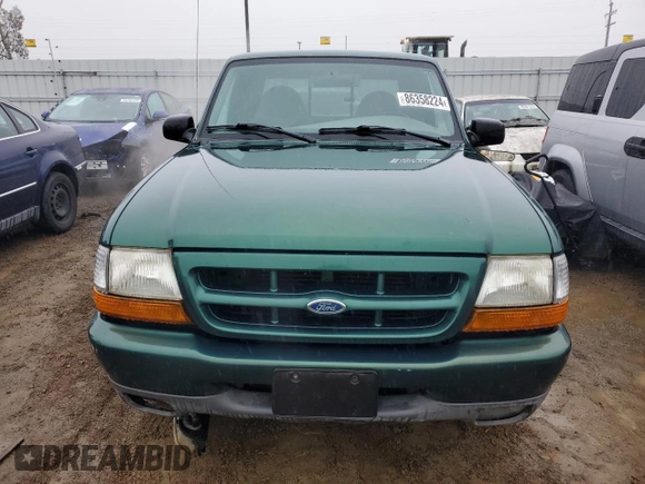 1999 Ford Ranger XLT with VIN 1FTYR14X7XPA76497, listed as a Copart auction lot 86358224 with 194,126 mi miles and Salvage Title. Bid and sale history available at DreamBid. Image 5.