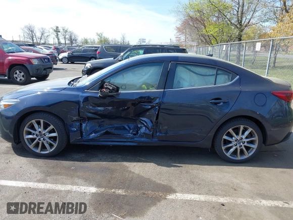 2018 Mazda 3 Grand Touring with VIN 3MZBN1W36JM213063, listed as a IAAI auction lot 42102460 with 49,180 mi miles and . Bid and sale history available at DreamBid. Image 14.