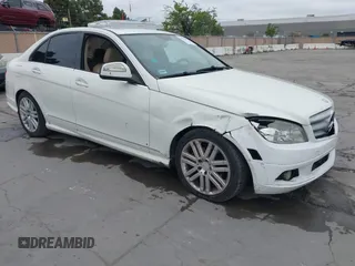 2009 Mercedes-Benz C-Class 3.0L Sport with VIN WDDGF54X19R082613, listed as a IAAI auction lot 42078992 with 140,707 mi miles. Bid and sale history available at carsss.com. Image 1.