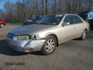 1999 Toyota Camry LE z VIN JT2BF22K4X0199123, wystawiony jako Copart lot #53456665 z przebiegiem 181 526 mil mil oraz Szkoda całkowita • Salvage title. Historia ofert i sprzedaży dostępna na DreamBid. Obrazek 1.