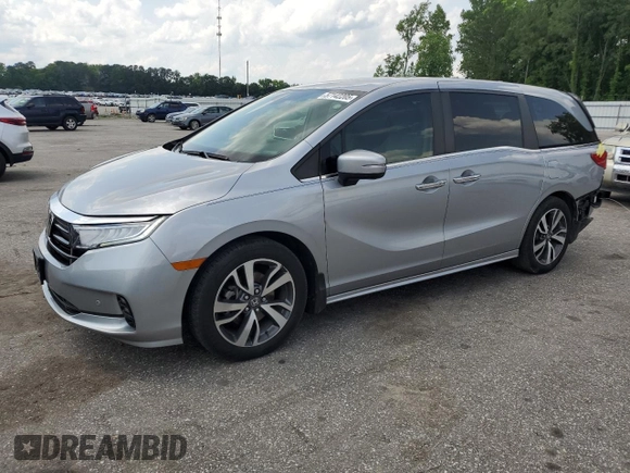 2021 Honda Odyssey Touring z VIN 5FNRL6H85MB039444, wystawiony jako Copart lot #57142205 z przebiegiem 74 228 mil mil oraz Szkoda całkowita • Salvage title. Historia ofert i sprzedaży dostępna na DreamBid. Obrazek 1.