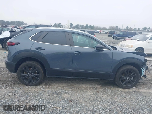 2023 Mazda CX-30 S Carbon Edition with VIN 3MVDMBCM5PM514304, listed as a IAAI auction lot 41795899 with 31,993 mi miles and . Bid and sale history available at DreamBid. Image 13.
