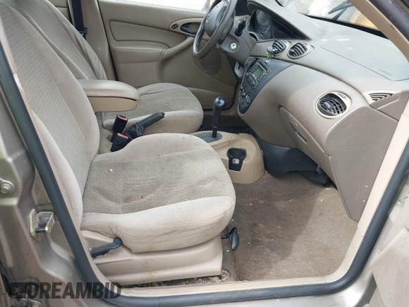 2003 Ford Focus SE with VIN 1FAFP34PX3W123696, listed as a IAAI auction lot 42065510 with 159,842 mi miles and . Bid and sale history available at carsss.com. Image 5.