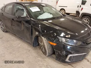 2019 Honda Civic Sedan LX with VIN 2HGFC2F69KH555697, listed as a IAAI auction lot 41664312 with 112,993 mi miles. Bid and sale history available at carsss.com. Image 6.