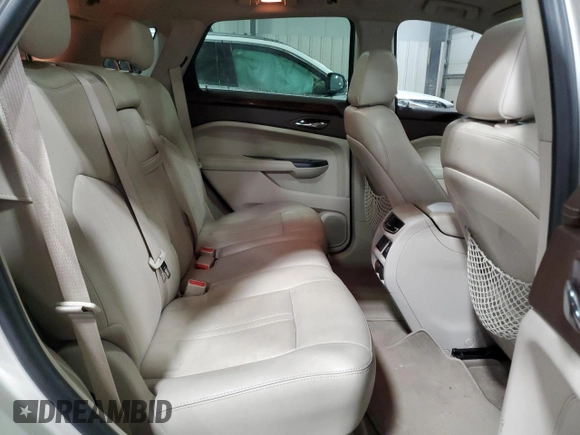 2014 Cadillac SRX Premium Collection с VIN 3GYFNDE3XES611363, выставлен на аукционе Copart как лот 50643475 с пробегом 57 749 миль миль и Списание • Salvage title. История ставок и продаж доступна на DreamBid. Изображение 11.
