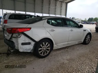 2015 Kia Optima EX z VIN 5XXGN4A75FG452374, wystawiony jako Copart lot #59928725 z przebiegiem 162 831 mil mil oraz Szkoda całkowita • Salvage title. Historia ofert i sprzedaży dostępna na DreamBid. Obrazek 3.