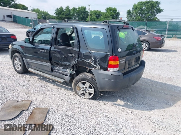 2007 Ford Escape XLS with VIN 1FMYU02ZX7KB90581, listed as a IAAI auction lot 42430544 with 164,595 mi miles and . Bid and sale history available at DreamBid. Image 3.