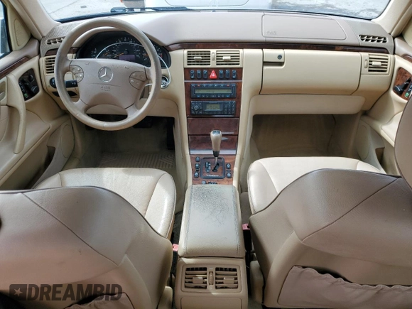 2000 Mercedes-Benz E-Class with VIN WDBJF82J0YX040071, listed as a Copart auction lot 50001165 with 145,638 mi miles and Salvage Title. Bid and sale history available at carsss.com. Image 8.