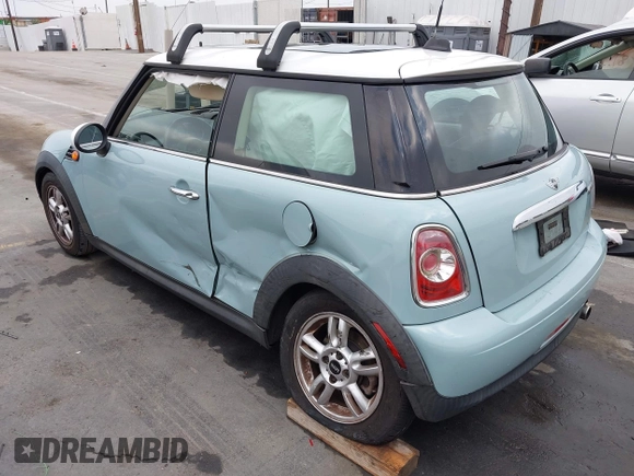 2013 MINI Hardtop with VIN WMWSU3C50DT546031, listed as a IAAI auction lot 42542290 with 119,711 mi miles and . Bid and sale history available at DreamBid. Image 3.