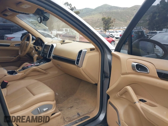 2012 Porsche Cayenne S Hybrid with VIN WP1AE2A25CLA90636, listed as a IAAI auction lot 41922089 with 90,318 mi miles and . Bid and sale history available at DreamBid. Image 5.