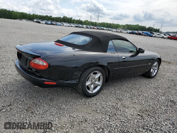 1999 Jaguar XK z VIN SAJGX2044XC031383, wystawiony jako Copart lot #54726925 z przebiegiem 107 696 mil mil oraz Szkody całkowita. Historia ofert i sprzedaży dostępna na DreamBid. Obrazek 3.