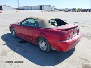 1999 Ford Mustang with VIN 1FAFP4445XF193138, listed as a IAAI auction lot 41716629 with 124,477 mi miles and . Bid and sale history available at DreamBid. Image 3.