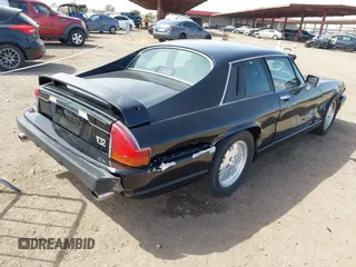 1989 Jaguar XJS with VIN SAJNA5840KC151334, listed as a IAAI auction lot 41702577 with 113,000 mi miles and . Bid and sale history available at DreamBid. Image 4.