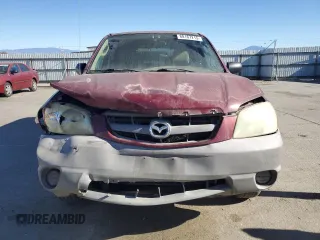 2003 Mazda Tribute DX with VIN 4F2YZ02B63KM48906, listed as a Copart auction lot 88167215 with 153,526 mi miles and Clean Title. Bid and sale history available at carsss.com. Image 5.
