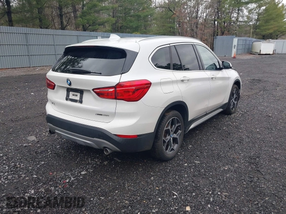 2018 BMW X1 xDrive28i with VIN WBXHT3C36J5L32162, listed as a IAAI auction lot 41802315 with 80,422 mi miles. Bid and sale history available at carsss.com. Image 4.