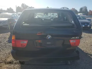 2003 BMW X5 3.0i with VIN 5UXFA53563LV96891, listed as a Copart auction lot 77636084 with 0 mi miles and Salvage Title. Bid and sale history available at carsss.com. Image 6.