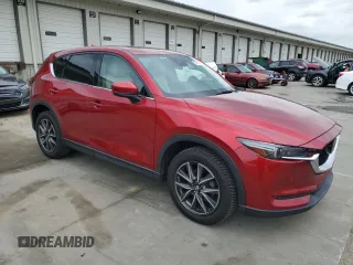 2018 Mazda CX-5 Grand Touring with VIN JM3KFADM8J0444455, listed as a Copart auction lot 59793055 with 60,839 mi miles and Salvage title. Bid and sale history available at DreamBid. Image 4.