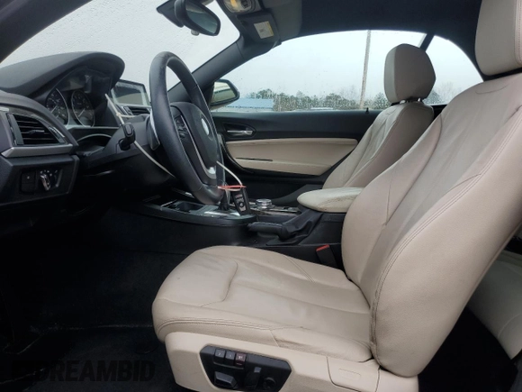2015 BMW 2 Series 228i with VIN WBA1K5C57FV474037, listed as a Copart auction lot 87857635 with 91,333 mi miles and Salvage title. Bid and sale history available at DreamBid. Image 7.