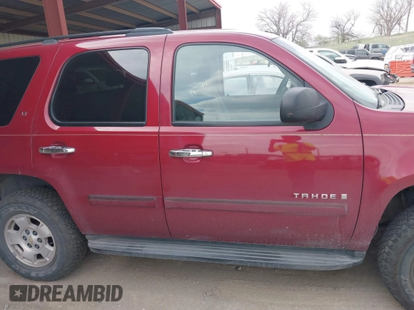 2007 Chevrolet Tahoe LTZ with VIN 1GNFK130X7J313106, listed as a IAAI auction lot 42042891 with 199,763 mi miles and . Bid and sale history available at DreamBid. Image 13.