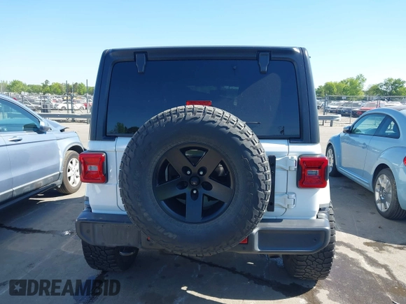 2018 Jeep Wrangler Unlimited Sahara z VIN 1C4HJXEG4JW106111, wystawiony jako IAAI lot #41994833 z przebiegiem 99 583 mil mil oraz . Historia ofert i sprzedaży dostępna na DreamBid. Obrazek 17.