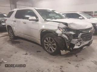 2018 Chevrolet Traverse Premier with VIN 1GNEVJKW2JJ103924, listed as a IAAI auction lot 41576128 with 128,694 mi miles. Bid and sale history available at carsss.com. Image 1.