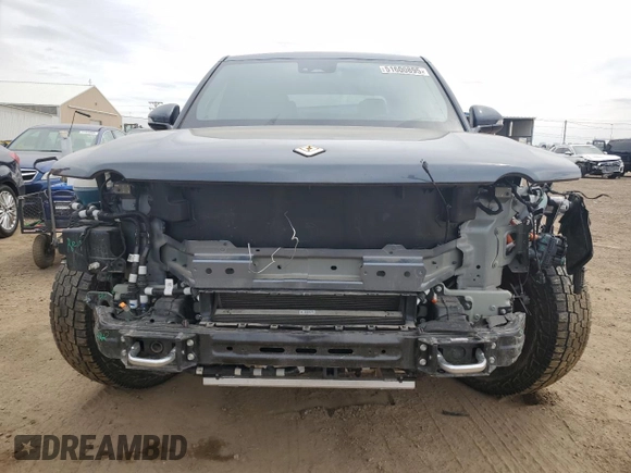 2023 Rivian R1T Adventure with VIN 7FCTGAAA3PN000801, listed as a Copart auction lot 51600895 with 19,486 mi miles and Salvage Title. Bid and sale history available at carsss.com. Image 5.