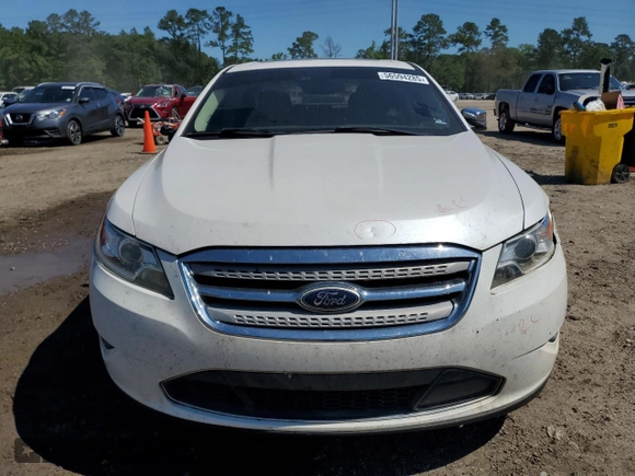 2011 Ford Taurus Limited with VIN 1FAHP2FW8BG141839, listed as a Copart auction lot 56594285 with 121,236 mi miles and Salvage title. Bid and sale history available at DreamBid. Image 5.