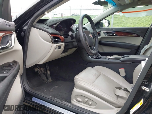 2014 Cadillac ATS Luxury AWD z VIN 1G6AH5SX0E0196052, wystawiony jako IAAI lot #41995886 z przebiegiem 97 531 mil mil oraz . Historia ofert i sprzedaży dostępna na DreamBid. Obrazek 5.