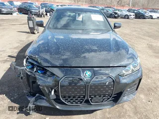 2024 BMW i4 xDrive40 z VIN WBY83FB04RFT19615, wystawiony jako IAAI lot #41679918 z przebiegiem 3 883 mil mil oraz . Historia ofert i sprzedaży dostępna na DreamBid. Obrazek 21.