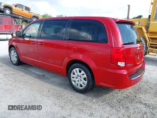 2014 Dodge Grand Caravan American Value with VIN 2C4RDGBG6ER309449, listed as a IAAI auction lot 42148824 with 198,532 mi miles and . Bid and sale history available at DreamBid. Image 3.