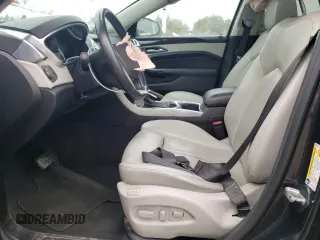 2014 Cadillac SRX Performance Collection z VIN 3GYFNCE36ES661204, wystawiony jako Copart lot #53478095 z przebiegiem 66 613 mil mil oraz Szkoda całkowita • Salvage title. Historia ofert i sprzedaży dostępna na DreamBid. Obrazek 7.