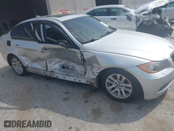 2007 BMW 3 Series 328xi with VIN WBAVC93597K034927, listed as a IAAI auction lot 42009274 with 184,427 mi miles and . Bid and sale history available at DreamBid. Image 1.