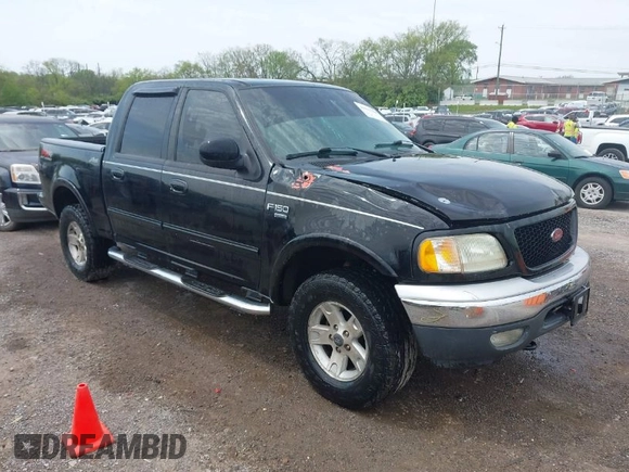 2002 Ford F-150 XLT with VIN 1FTRW08L72KD27457, listed as a IAAI auction lot 41993148 with 372,589 mi miles. Bid and sale history available at carsss.com. Image 1.