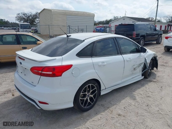 2015 Ford Focus SE with VIN 1FADP3F25FL281314, listed as a IAAI auction lot 41618483 with 110,200 mi miles. Bid and sale history available at carsss.com. Image 4.
