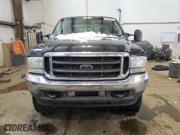 2004 Ford F-350 XL with VIN 1FTSW31P74EA91328, listed as a Copart auction lot 85856984 with 291,033 mi miles and Salvage Title. Bid and sale history available at DreamBid. Image 5.