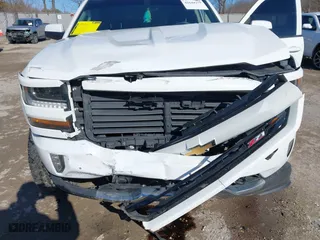 2018 Chevrolet Silverado 1500 LT with VIN 1GCVKREC5JZ350034, listed as a IAAI auction lot 41649277 with 112,673 mi miles. Bid and sale history available at carsss.com. Image 6.