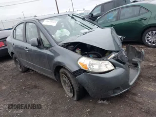 2008 Suzuki SX4 with VIN JS2YC412985103746, listed as a IAAI auction lot 42029023 with 123,154 mi miles. Bid and sale history available at carsss.com. Image 1.
